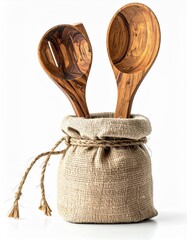 A stylish display of wooden cooking spoons nestled in a textured burlap pouch, perfect for kitchen decor or culinary art.