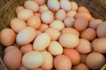 Close-Up of a Basket of Fresh Farm Eggs – Rustic Organic Brown Eggs with Natural Texture