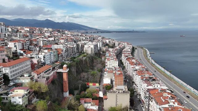 Aerial 4k view of the historical elevator, the symbol of Izmir city, on a sunny day