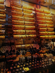 showcase with gold jewelry, bracelets, rings, earrings, oriental bazaar