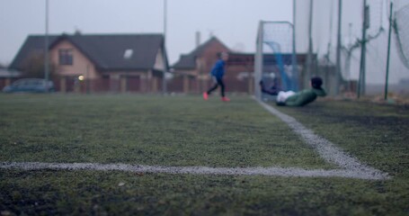 A lively soccer match on an open field showcases diverse players energy and enthusiasm. Children and adults demonstrate teamwork and skill, filled with laughter and cheers - Powered by Adobe