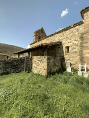 Stone church of San Martin in Parapetu with old cemetery