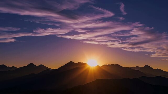 Majestic sunrise over the mountains brings a new day bursting with colors and possibilities