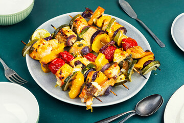 Salmon fish grilled skewers.