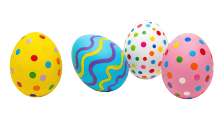 Four distinct hand-painted Easter eggs, vibrant yellow with polka dots, light blue with wavy lines, white with multi-colored dots, pastel pink with bright dots, arranged on a transparent studio