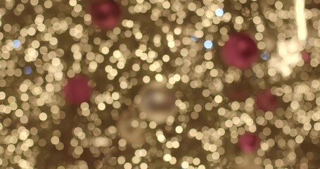 This video showcases a beautiful Christmas tree adorned with dazzling lights and vibrant decorations, evoking the holiday spirit and joy - Powered by Adobe