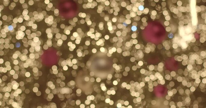 This video showcases a beautiful Christmas tree adorned with dazzling lights and vibrant decorations, evoking the holiday spirit and joy