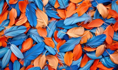 Vibrant feathers in blue and orange a textured and abstract background