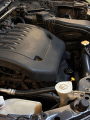A detailed view of a powerful car engine, showcasing its complex mechanical components and engineering