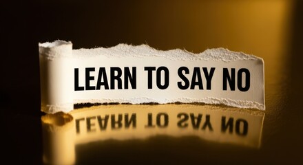 Torn Paper Strip with "LEARN TO SAY NO" Message and Reflection