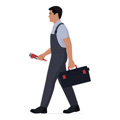 Professional plumber walking and holding tools