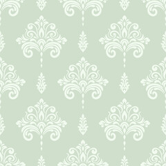 Seamless damask floral pattern on green background.