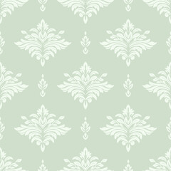 Seamless damask floral pattern on green background.