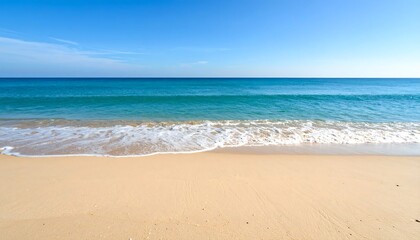 Fototapeta premium Picturesque seascape view featuring crystal clear turquoise waters and smooth sandy beach
