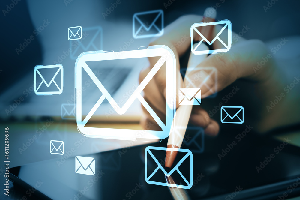 Poster digital email icons floating over a person using a stylus on a tablet, symbolizing online messaging 
