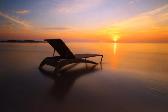 Close-up of a Sun lounger on a beach at sunrise, Nusa Dua, Bali, Indonesia