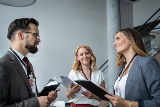 Business people discussing during corporate event or conference