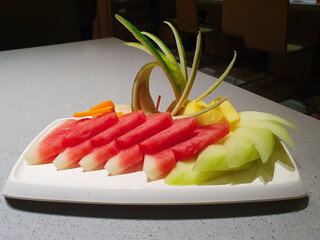 Fruit Plater on white square plate on dining table