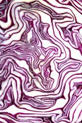 Obraz premium Close up of a sliced red cabbage pattern abstract background