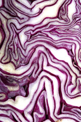 Obraz premium Close up of a sliced red cabbage pattern abstract background