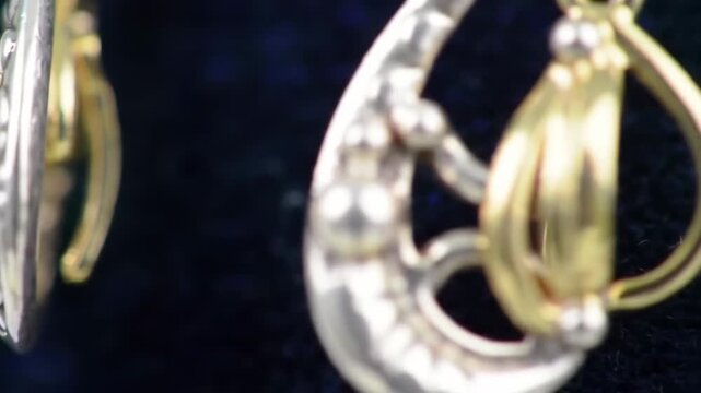 Close-up of intricate earrings