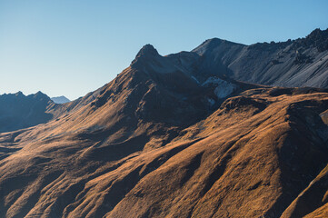 Naklejka premium autumnal mountain landscape inside the Stelvio National Park along the Lombard side, Sondrio, Italy