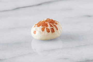 Close-up of a puffed lotus seed, makhana, an exotic vegetable ingredient
