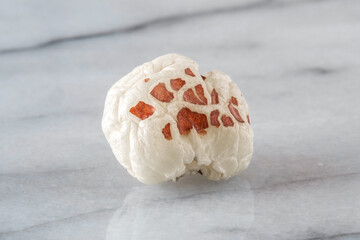 Close-up of a puffed lotus seed, makhana, an exotic vegetable ingredient
