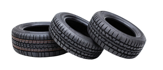 Three different types of car tires stacked on each other, showcasing tread patterns for automotive use