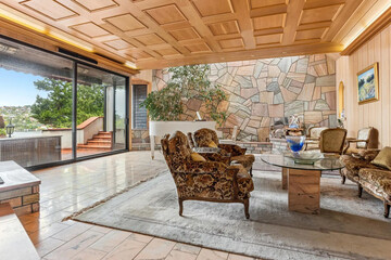 cozy luxury summer terrace with furniture