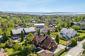 beautiful areal view of typical norwegian village from above with luxury villas sea fishermen's...