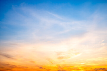 Beautiful , luxury soft gradient orange gold clouds and sunlight on the blue sky perfect for the background, take in evening,Twilight, Large size, high definition landscape photo