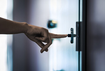 Door bell ring by guest, neighbor or visitor. Family surprise visit. Doorbell. Angry neighbour complain. Apartment building corridor. Finger press button. City home interior. Woman at flat entrance.