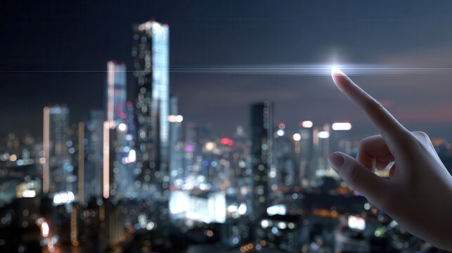 Fingertip interacting with a futuristic interface over a cityscape at night.