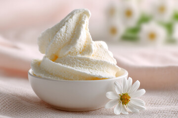 Whipped Delight: A creamy white swirl in a bowl, accented by a delicate white flower, evokes light, airy sweetness. Summer freshness!