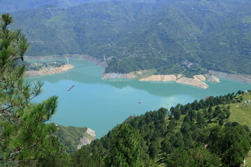 Tehri Lake, nestled in the Garhwal Himalayas of Uttarakhand, is a stunning man-made reservoir...