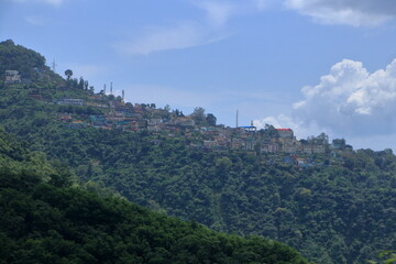Fototapeta premium Narendra Nagar, located in Tehri Garhwal district of Uttarakhand, is a peaceful hill town known for its scenic beauty, royal history, and panoramic views of the Himalayas and the Ganga valley. 