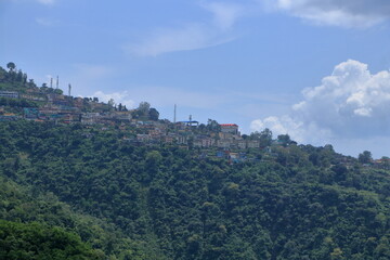 Fototapeta premium Narendra Nagar, located in Tehri Garhwal district of Uttarakhand, is a peaceful hill town known for its scenic beauty, royal history, and panoramic views of the Himalayas and the Ganga valley. 