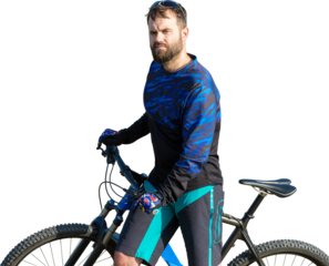 Cyclist in shorts and jersey on a modern carbon hardtail bike with an air suspension fork standing on a cliff against the background of fresh green spring forest