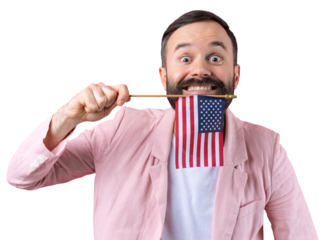 Portrait of a satisfied young man with a beard with an American flag on a red studio background. Great US patriot and defender of freedom.