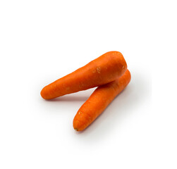 Fresh Carrot isolated on white background. Two carrots with green leaves. With clipping path. Full depth of field. pile of fresh carrots. High resolution food or salad item image.