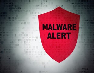 A close-up view of a computer screen displaying a bright red malware alert, featuring warning icons and a message indicating potential threats detected.
