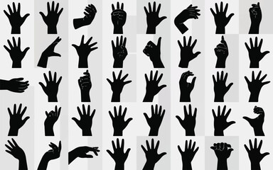 Collection of forty black hand silhouettes displaying a variety of gestures and poses