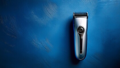sleek grooming tool positioned against a textured blue wall showcasing modern design and functionality