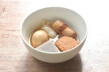 boiled Oden or fish ball and egg in clear soup Japanese food on bowl