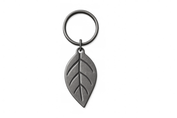 Metallic keychain with leaf-shaped pendant, gleaming against transparent backdrop, highlighting elegant design and portable accessory