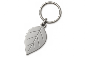 Silver keychain with leaf-shaped pendant, delicately hanging, transparent background enhancing minimalist design potential