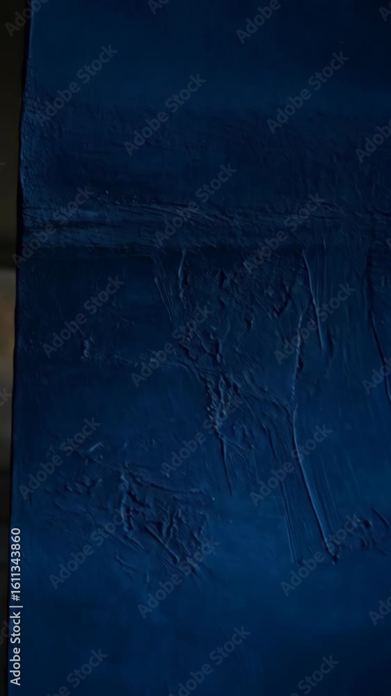 Poster textured dark blue background with plaster effect and gradients ideal for use as presentation backdr