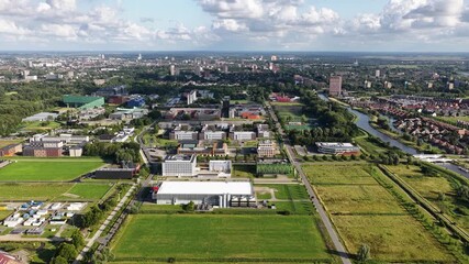 Aerial view of a modern data center on the outskirts of Groningen, Netherlands - Powered by Adobe