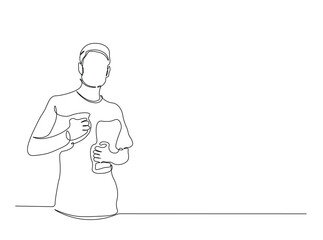 Young man holding books in single outline illustration. Continuous line art drawing of student holding books.